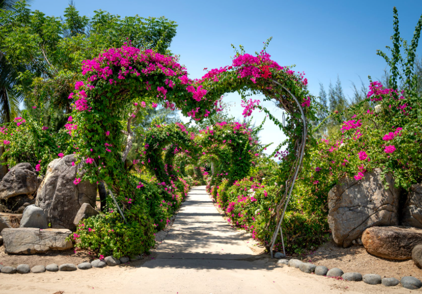 Heart shaped arches over garden path.