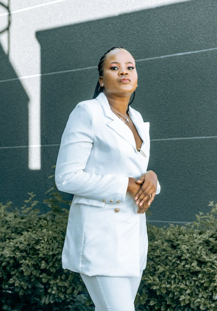 Woman in white business suit