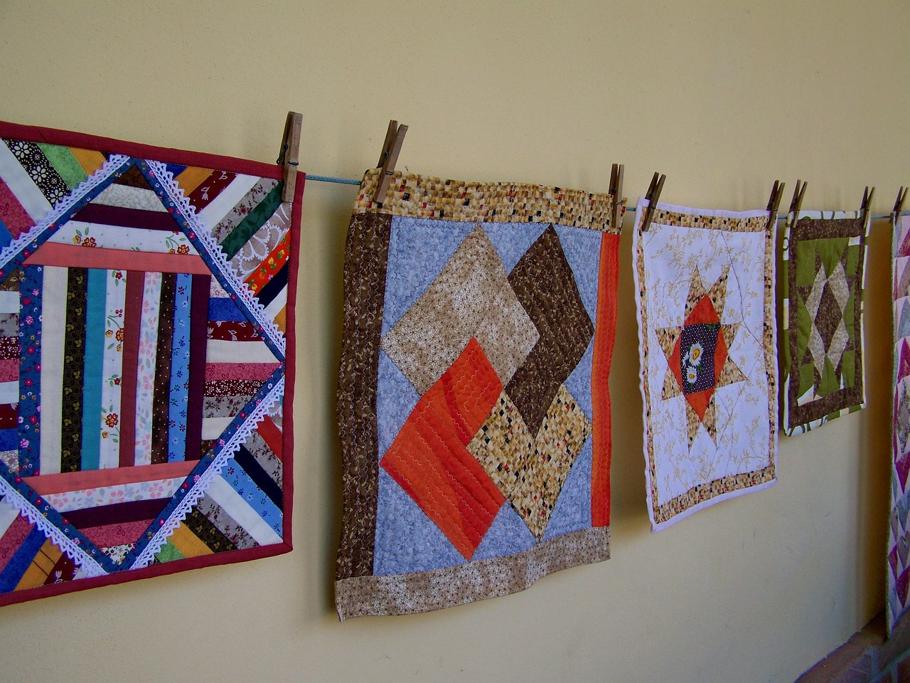quilts hanging as wall art